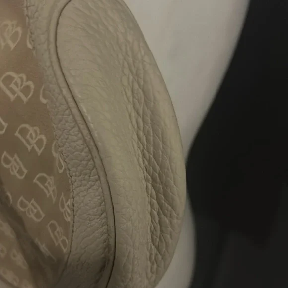 Dooney and Bourke vintage hobo purse in the color cream. - Picture 10 of 14